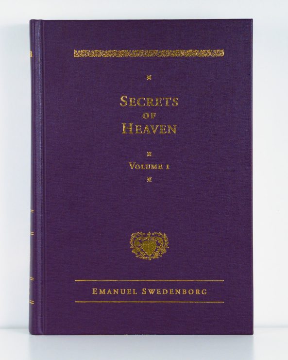 Purple cloth hardcover book with gold foil embossed type and ornaments