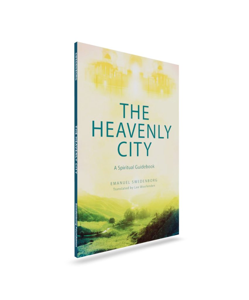 Paperback book upright front cover with golden city floating above sunlit valley