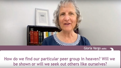 57.23 - Swedenborg Foundation Karin sits at her desk in front of a bookshelf. A question from audience member Gloria Vargo appears across the bottom of the screen, reading: "How do we find our particular peer group in heaven? Will we be shown or will be seek out others like ourselves?"