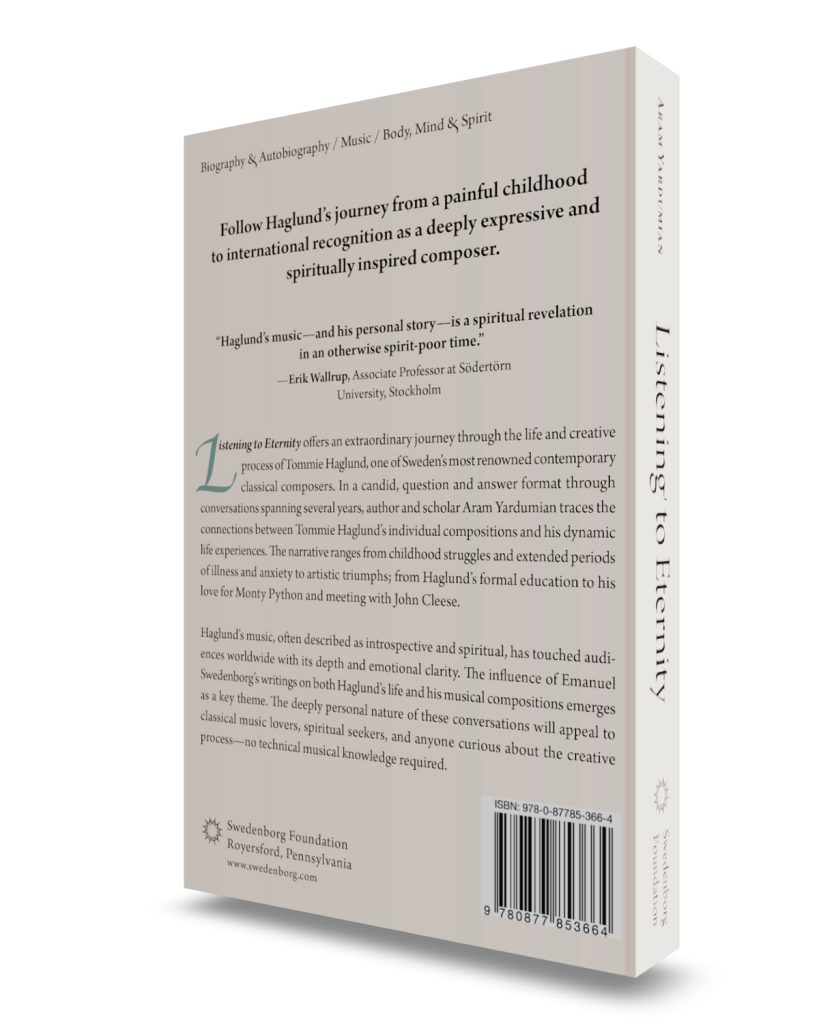 Back of book at three-quarter angle with light colored background and black text