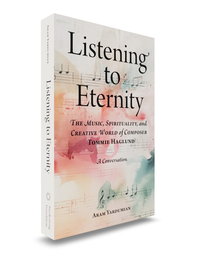 Book cover at an angle with large black text and a colorful watercolor background